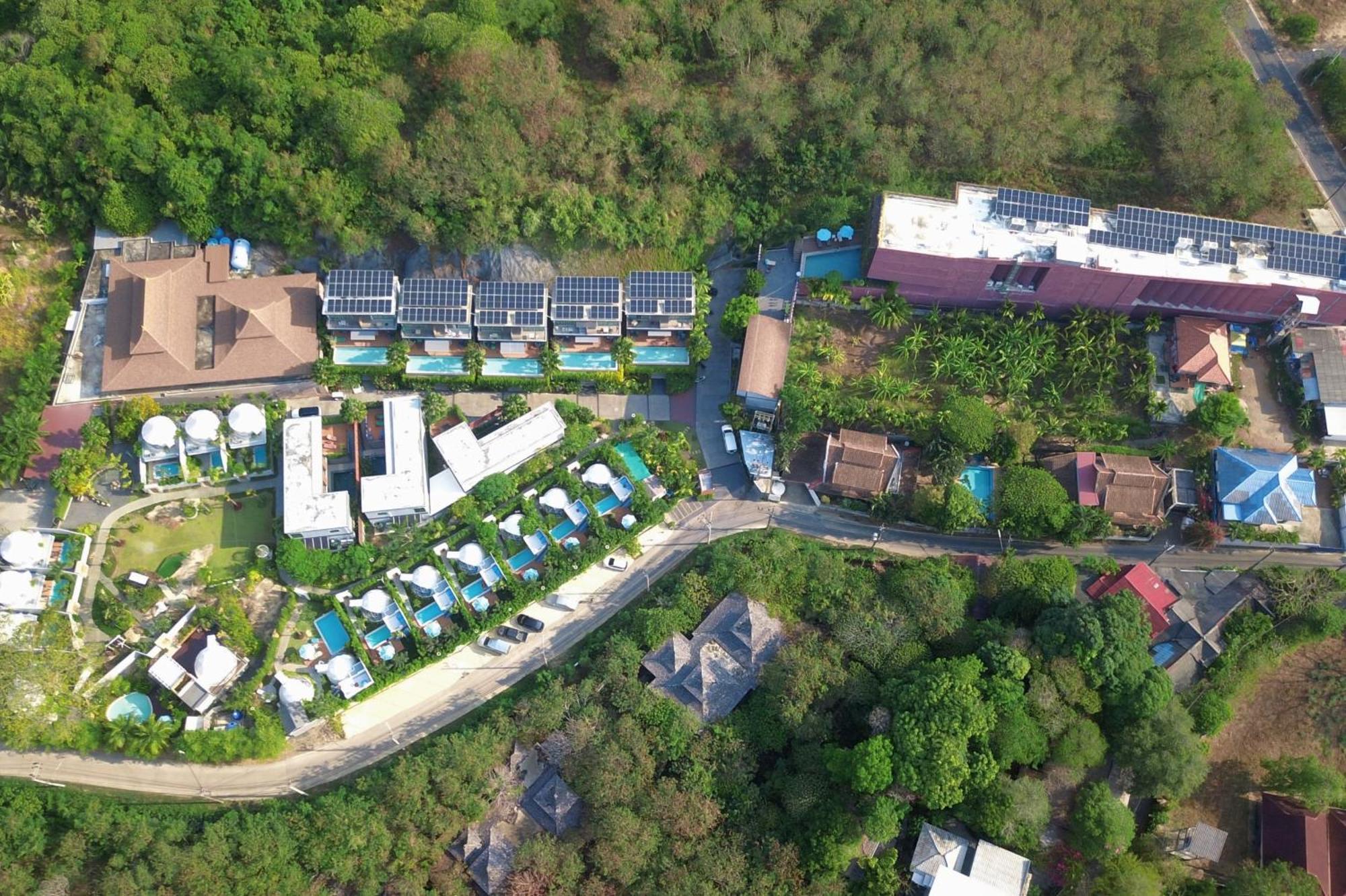 Le Resort And Villas Rawai Ngoại thất bức ảnh Aerial view of the village